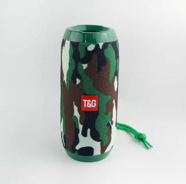 Portable wireless speaker with green camouflage fabric and T&G logo on white background