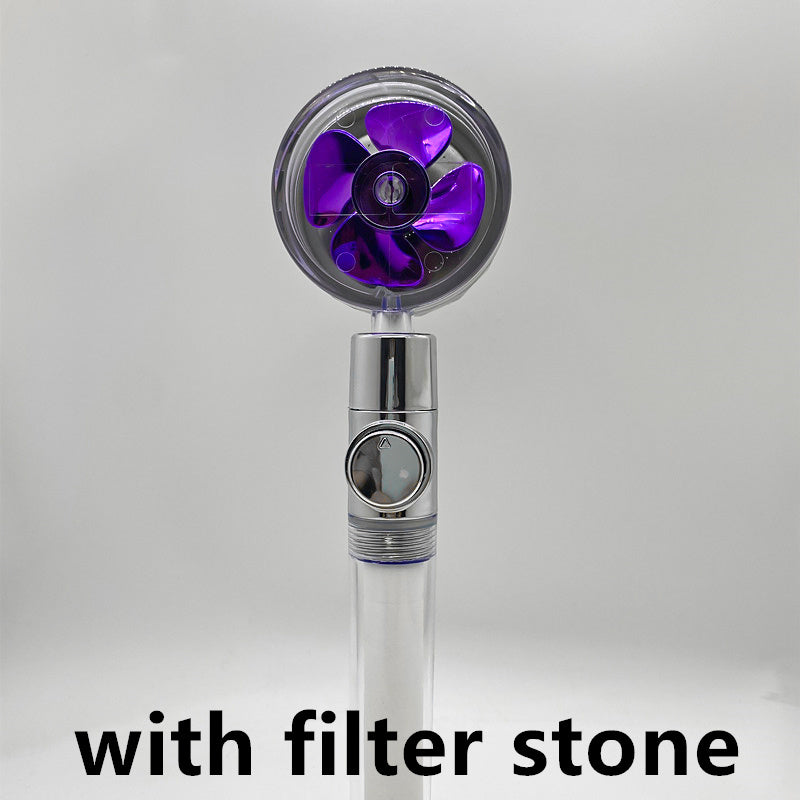 modern handheld shower head with purple fan blades and filter stone feature on white background