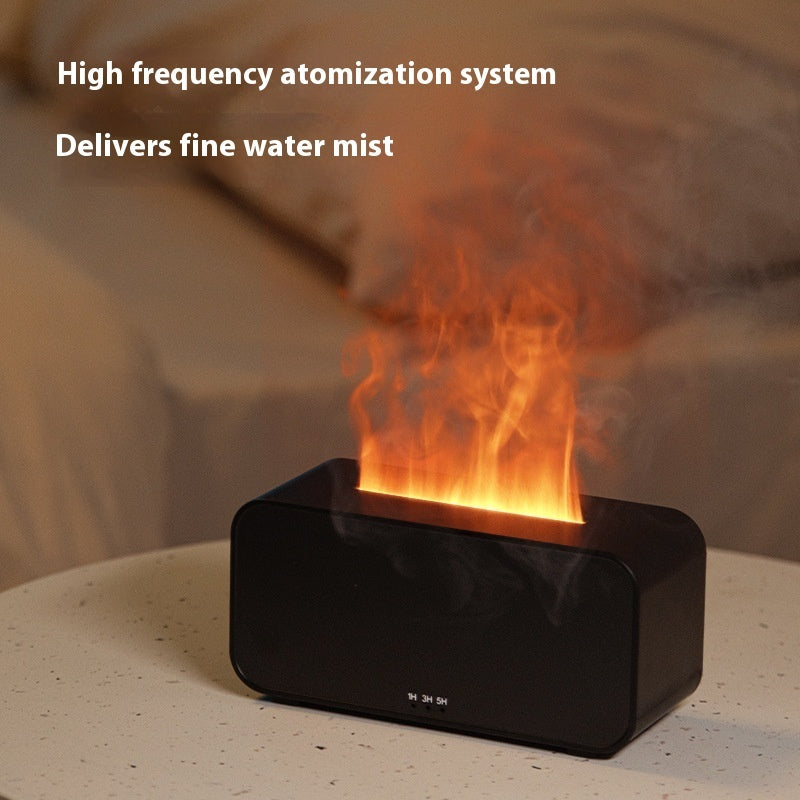 Modern black humidifier on beige table releasing fine water mist with orange light glow