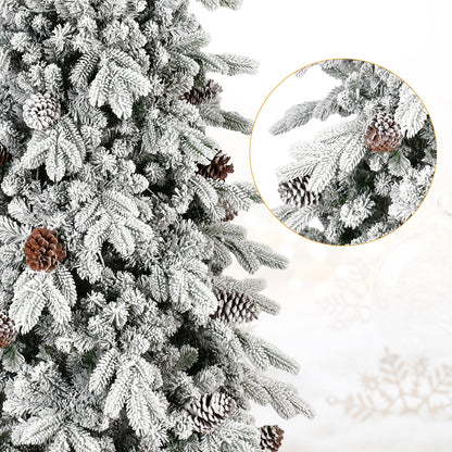 Flocked artificial Christmas tree with pine cones and frosted branches, winter holiday decor