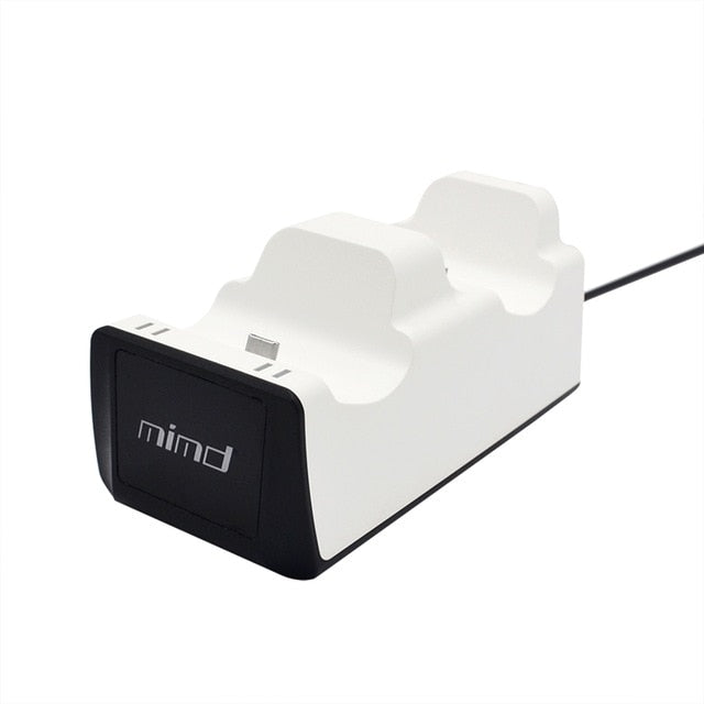 White dual docking station charger with black front panel and 'mind' logo, connected by a cable