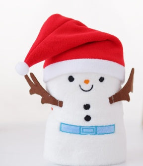 Cute white snowman plush wearing red Santa hat with brown stick arms and blue belt