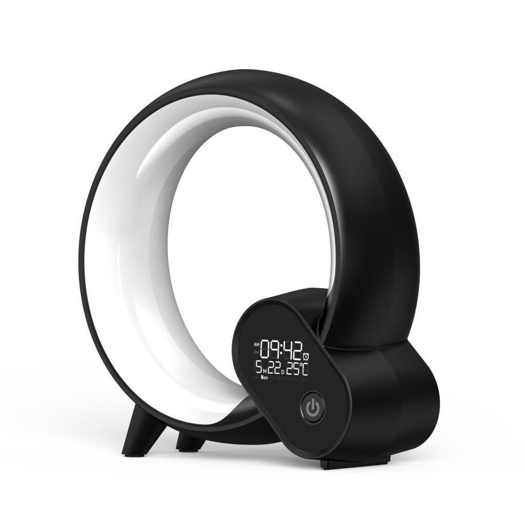 Modern black circular bladeless fan with digital clock, temperature display, and power button