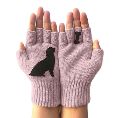 Pair of pink fingerless gloves with black dog silhouette and bone design on palms