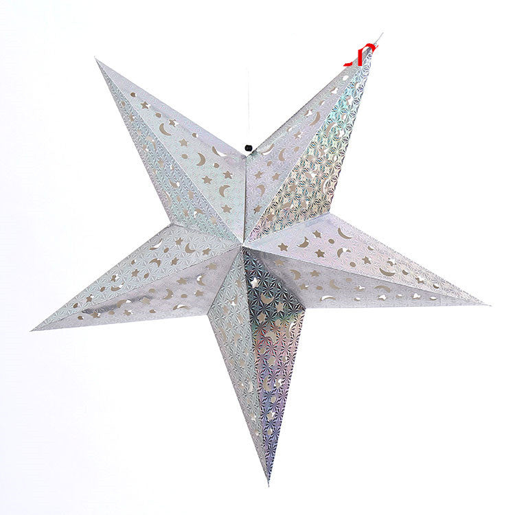 Silver hanging star lantern with moon and star cutouts and geometric patterns on white background