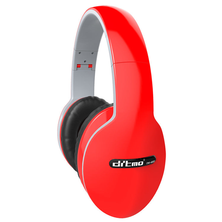 Bright red DITMO DM-6860 wireless over-ear headphones with black padded ear cushions and white headband interior