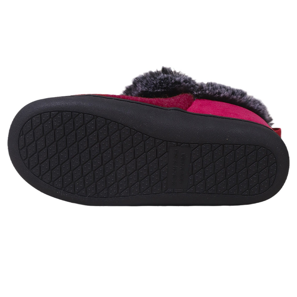 Bottom view of red winter slipper with black rubber sole and gray fur trim