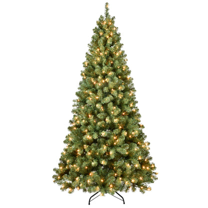 Lighted artificial Christmas tree with green branches on metal stand isolated on white