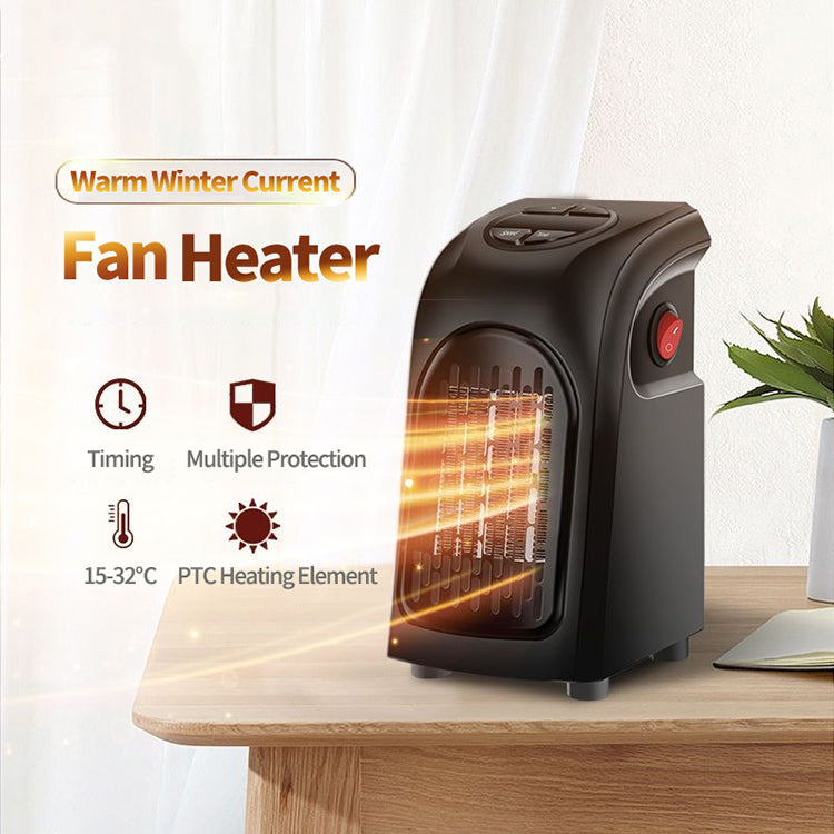 Compact black fan heater on wooden table with digital display, red switch, and warm airflow