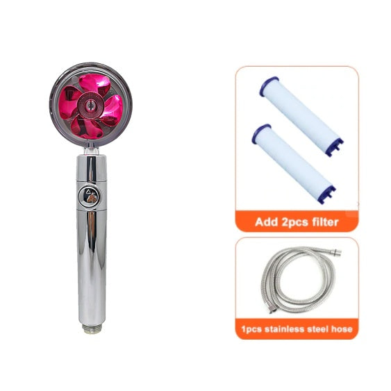 Chrome handheld shower head with pink fan inside, two white filters, and stainless steel hose included