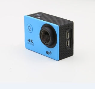 Blue 4K Ultra HD action camera with wide-angle lens and dual USB ports on side