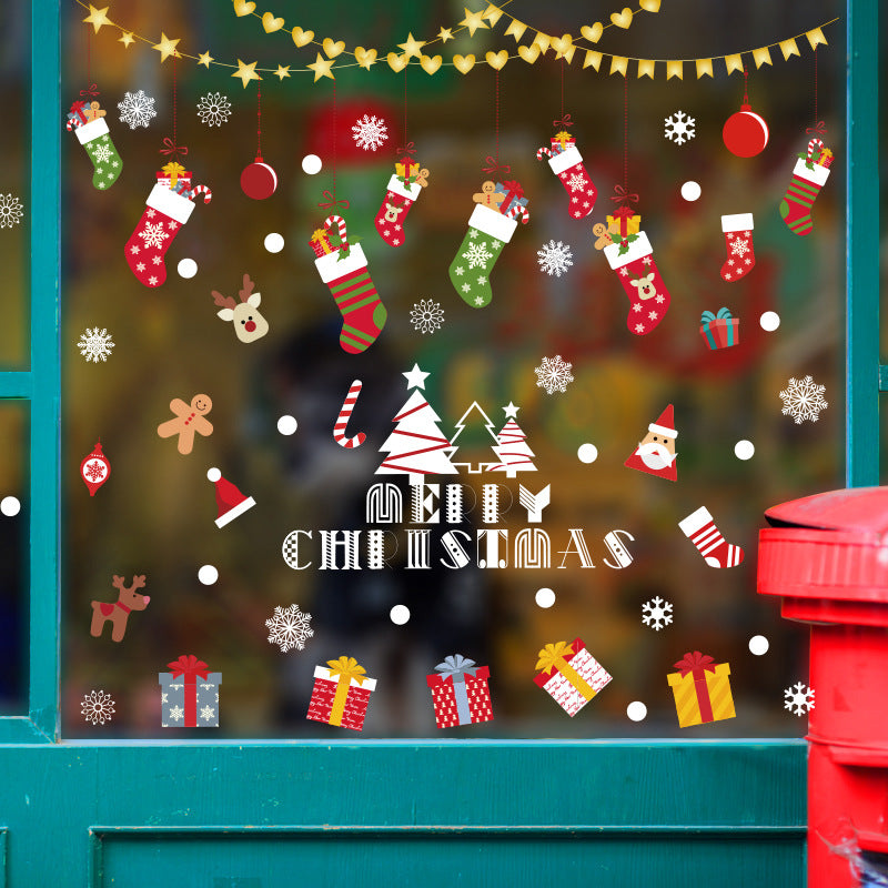 Christmas window decal with stockings, gifts, snowflakes, reindeer, and Merry Christmas text
