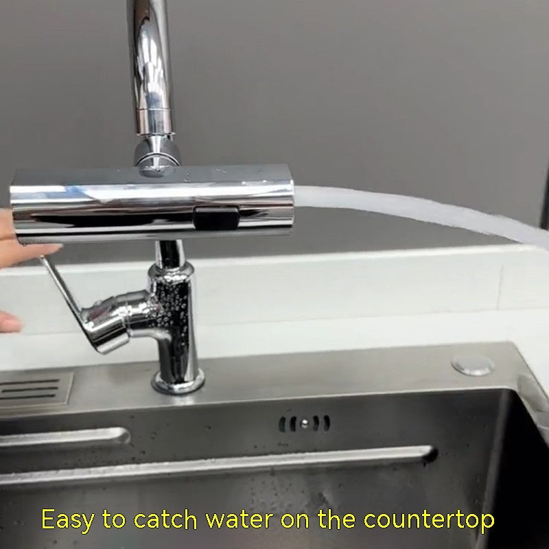 Modern chrome kitchen faucet with water flowing into stainless steel sink on white countertop
