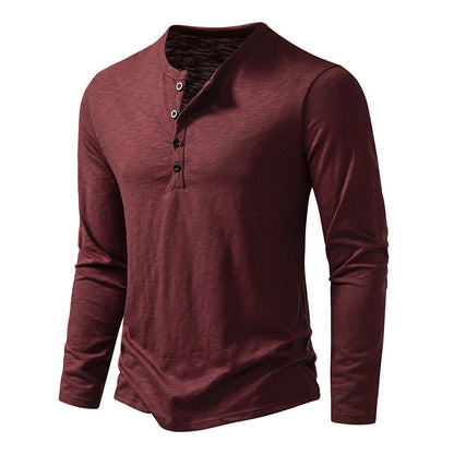 Men's long sleeve burgundy henley shirt with button placket on white background