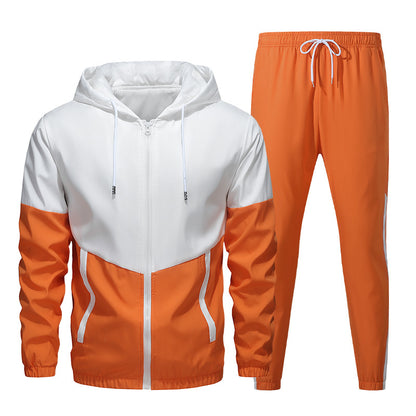 Two-piece men's tracksuit with white and orange zip-up hoodie and matching orange jogger pants