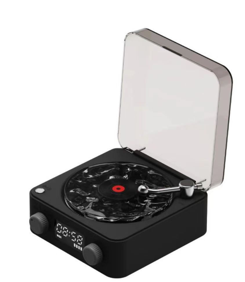 Modern black vinyl record player with digital display and transparent dust cover open