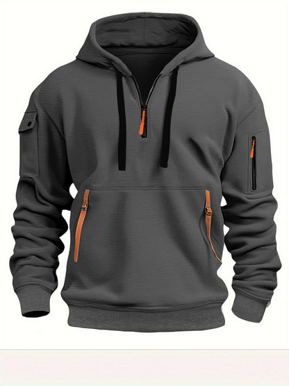 Dark gray hooded sweatshirt with black drawstrings, orange zipper pulls, and zippered pockets