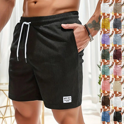 Men's casual ribbed black shorts with white drawstring and pocket detail, displayed in multiple colors