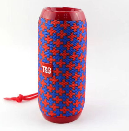 Portable T&G wireless Bluetooth speaker with red and blue patterned fabric and red ends
