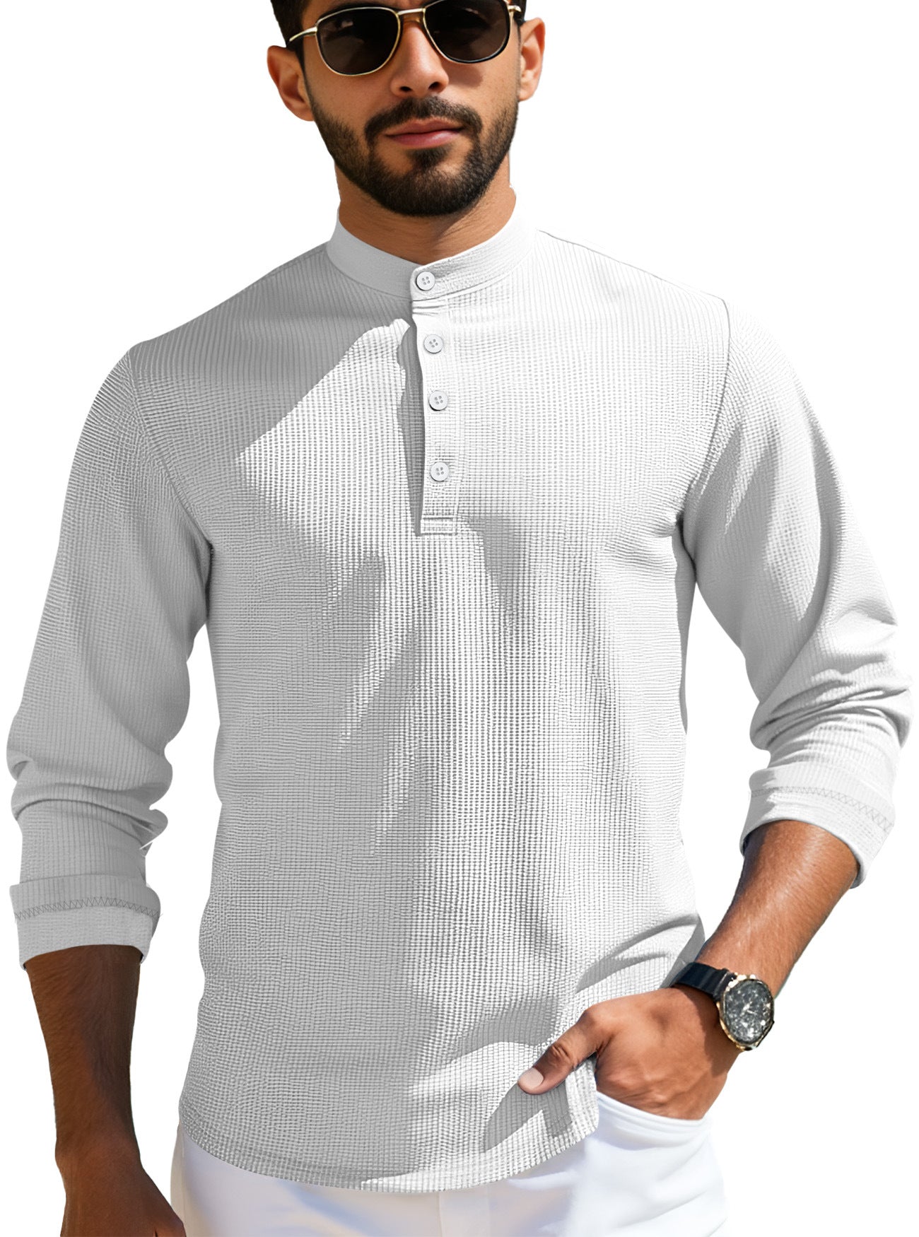 Man wearing white textured henley shirt with mandarin collar and sunglasses