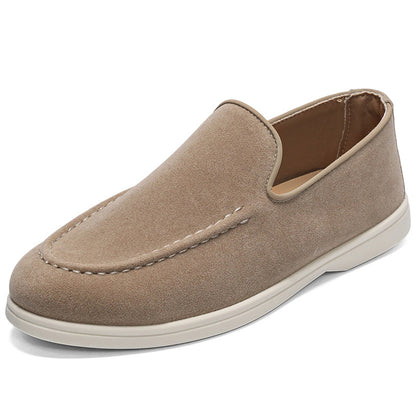 Light brown suede slip-on casual men's shoe with white sole and decorative stitching