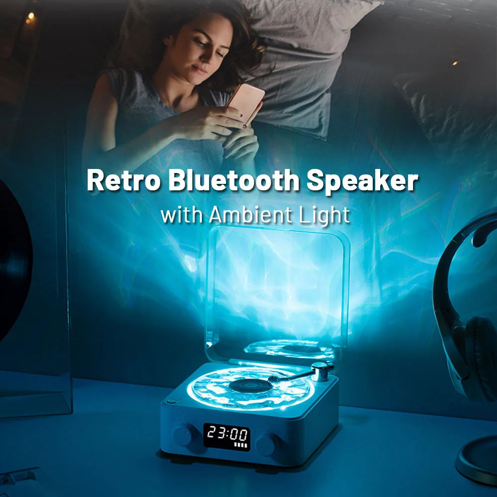 Retro Bluetooth speaker with ambient light projecting blue glow on nightstand near woman using phone in bedroom