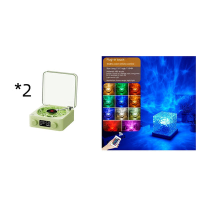 Two green retro-style turntable alarm clocks with LED display and a cube RGB color changing night light with remote control