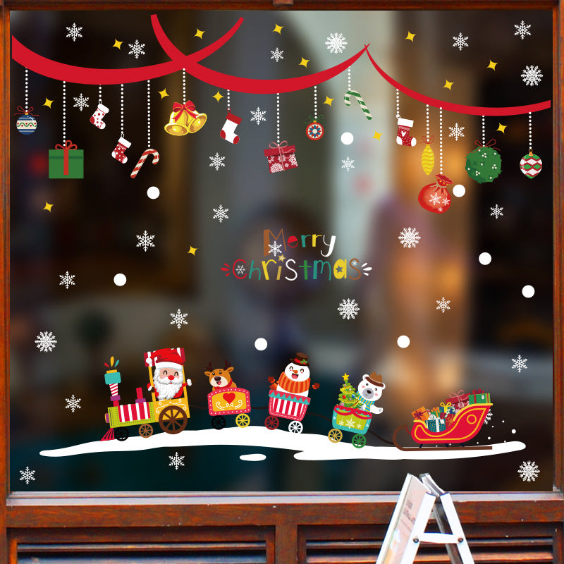 Christmas window decal with Santa, reindeer, snowman, polar bear train and hanging festive decorations