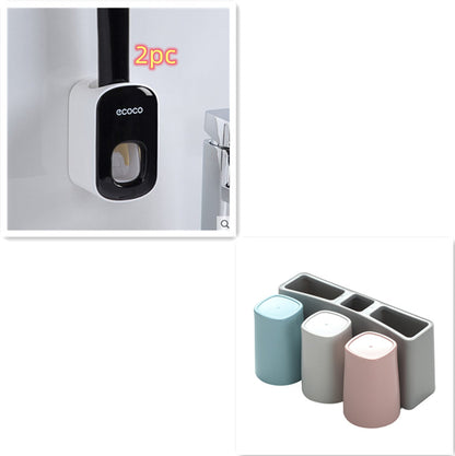 Ecoco black wall-mounted toothbrush holder and pastel-colored toothbrush covers with gray organizer box
