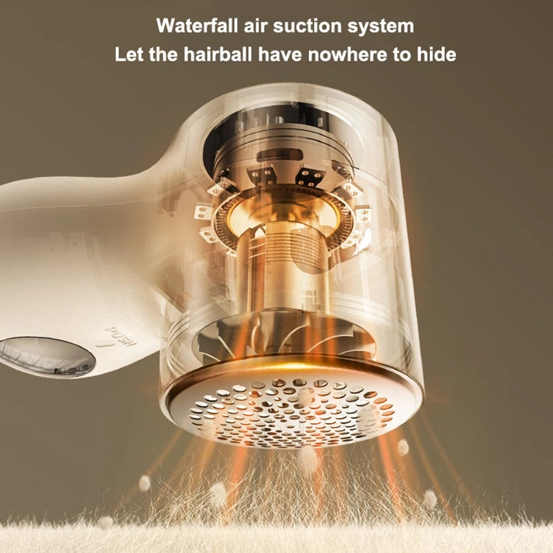 Close-up of a hairball remover device with waterfall air suction system extracting hair from fabric