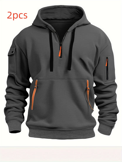Gray hooded sweatshirt with orange zipper pulls, front pockets, arm zipper pocket, and black drawstrings