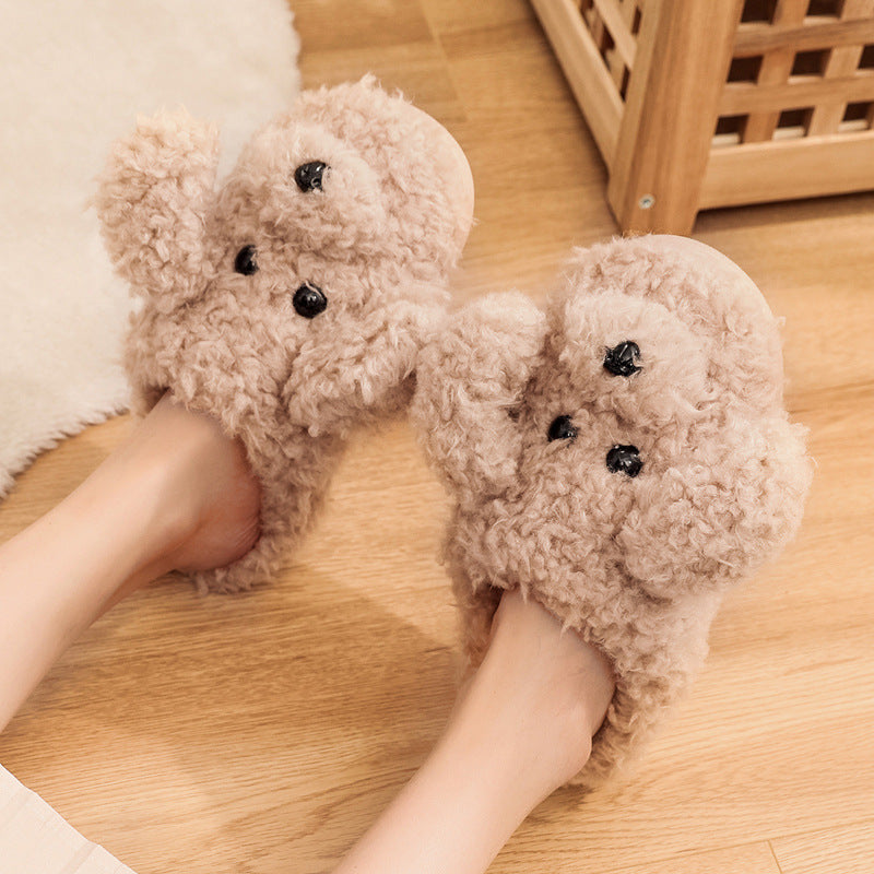 Cozy beige teddy bear slippers on feet on wooden floor with white rug and wicker basket