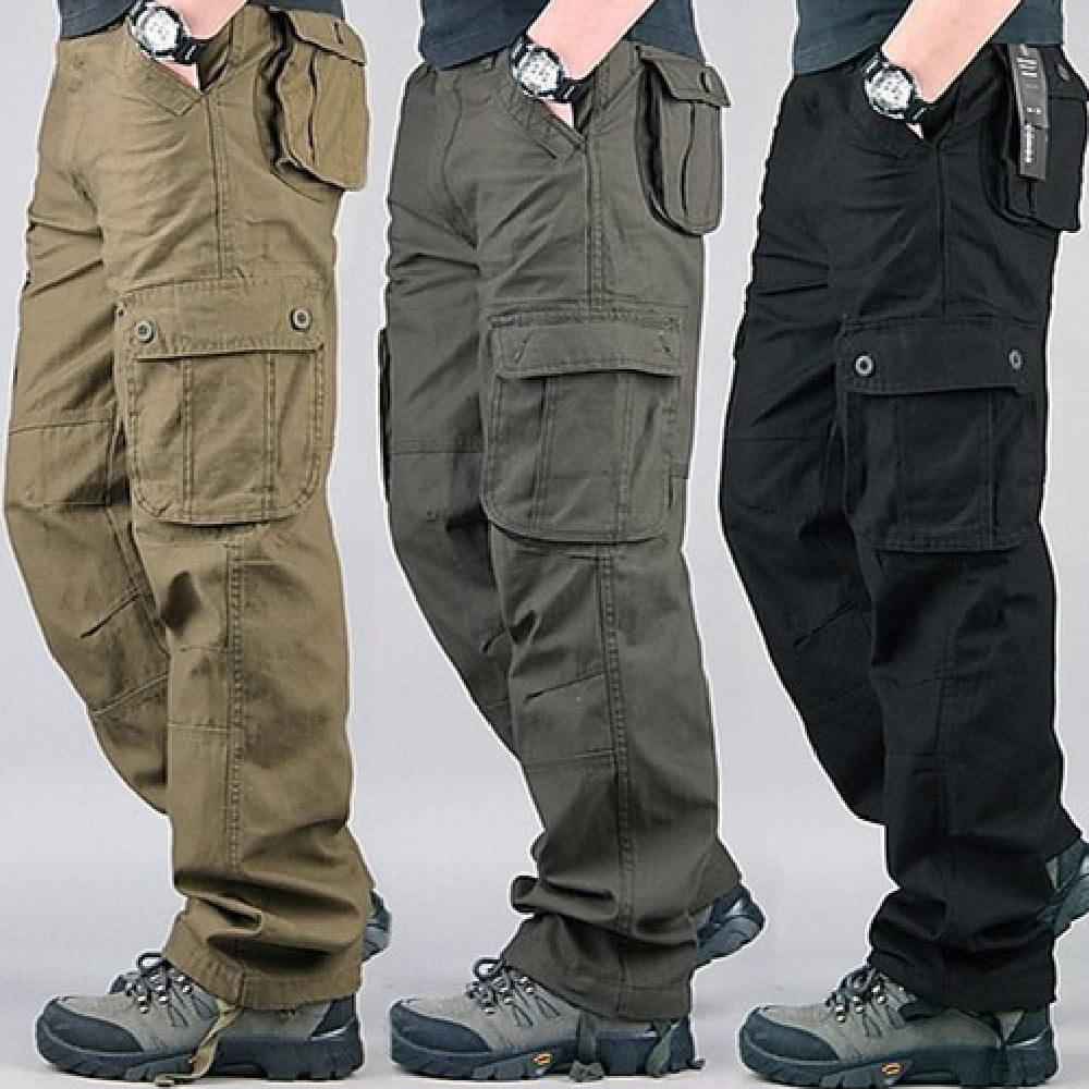 Men wearing brown, green, and black cargo pants with large pockets, paired with hiking shoes