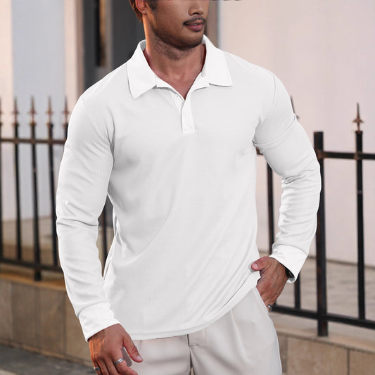 Man wearing white long-sleeve textured polo shirt and light pants, outdoor urban setting