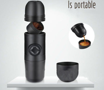 Portable black coffee maker with detachable parts and built-in dial on a white surface