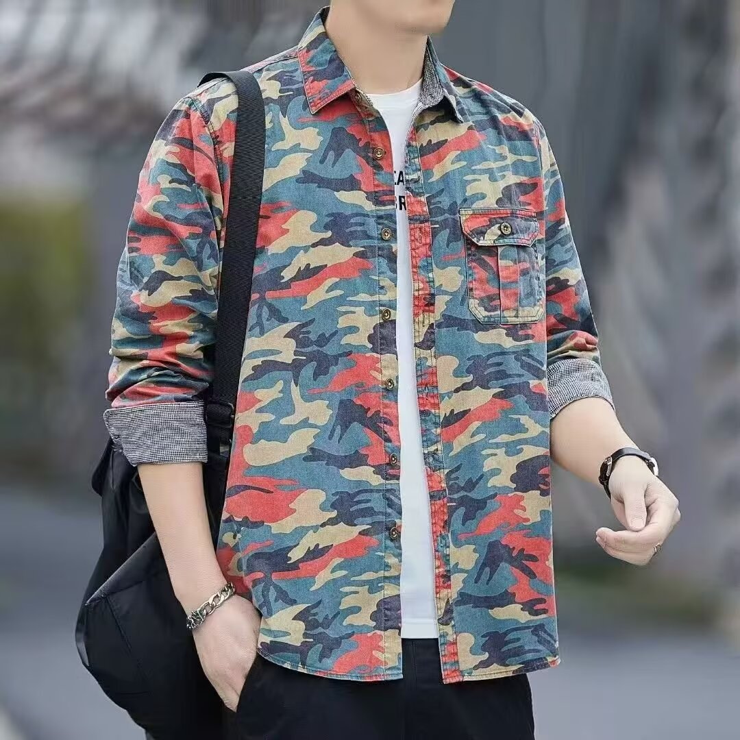 Man wearing multicolor camouflage print button-up shirt with black bag strap on shoulder