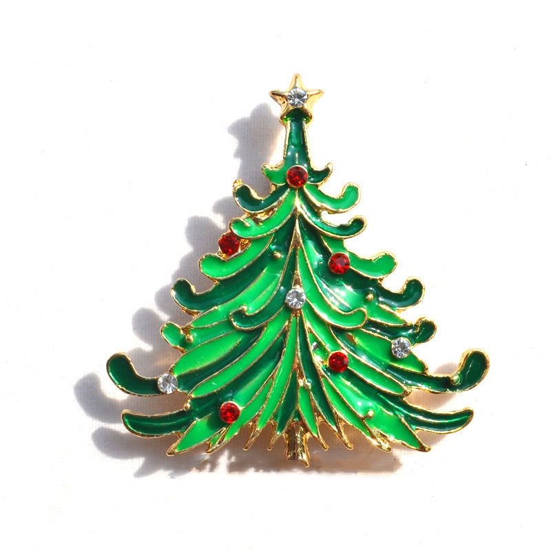 Green Christmas tree brooch with gold edges and red and clear rhinestone decorations