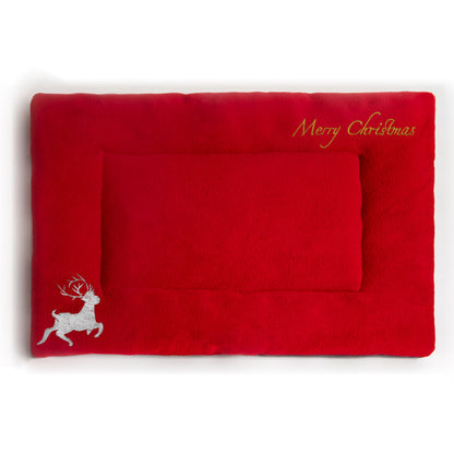 Red Christmas-themed pet bed with embroidered white reindeer and gold Merry Christmas text