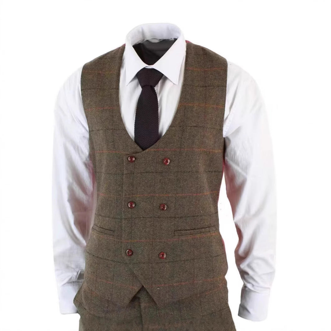 Brown plaid tweed vest with double-breasted buttons over white dress shirt and black tie