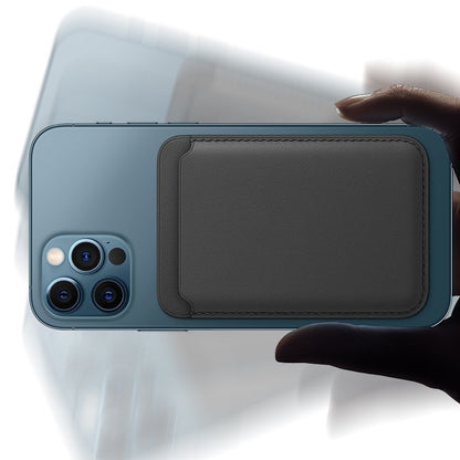 Blue smartphone with triple camera held by hand featuring attached black leather magnetic wallet