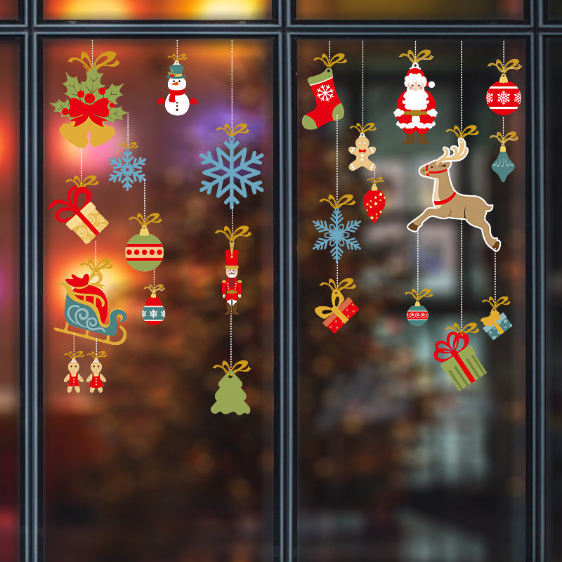 Colorful Christmas window decals featuring Santa, reindeer, snowflakes, gifts, ornaments, and festive decorations