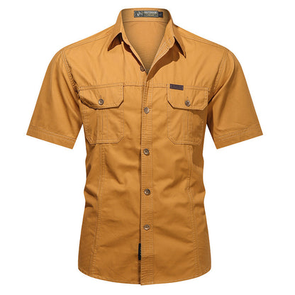 Men's short-sleeve mustard button-up shirt with dual chest pockets and outdoor label