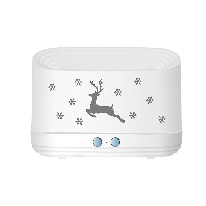 White humidifier with reindeer and snowflake winter design and two blue control buttons