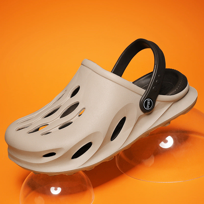 Beige sport clog with black adjustable heel strap on orange background