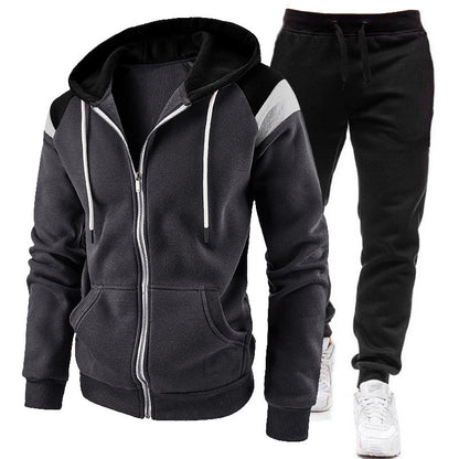 Men's black zip-up hoodie with white drawstrings and black jogger pants with white sneakers