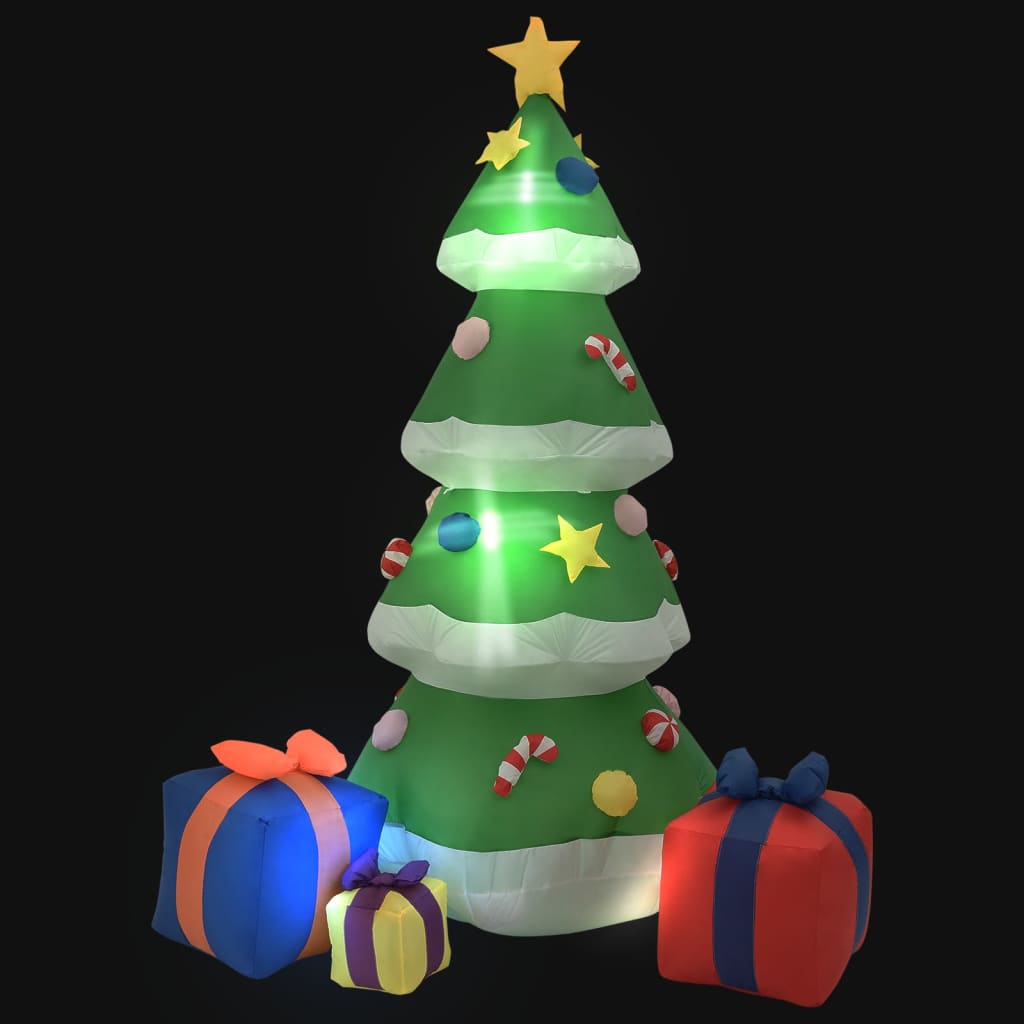 Inflatable Christmas tree decoration with stars, candy canes, and colorful presents against black background