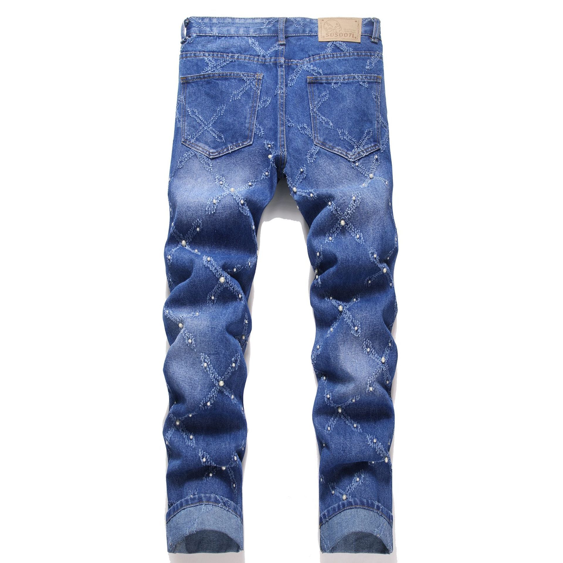 Back view of blue denim jeans with embroidered diamond pattern and pearl embellishments