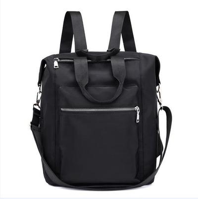 Black backpack with multiple zippered compartments, adjustable shoulder and hand straps