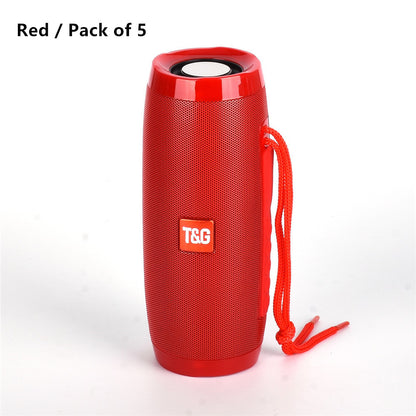 Red portable T&G Bluetooth speaker with cylindrical design and carrying strap