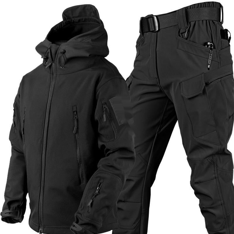 Black tactical jacket with multiple zippered pockets and black cargo pants with belt and pockets